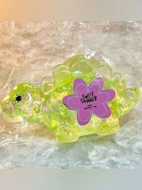 Ulta Beauty Sweet & Shimmer Green Glitter Dino Squishy Toy